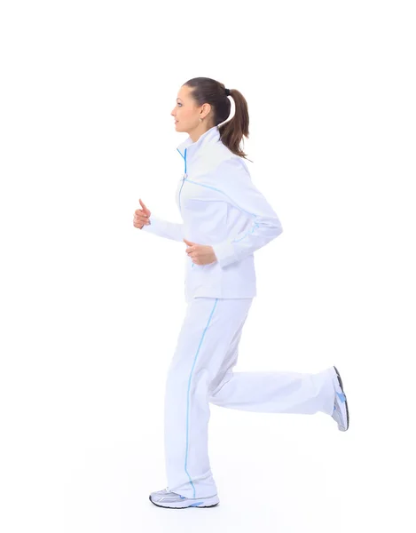 Menina atraente correndo isolado no fundo branco — Fotografia de Stock