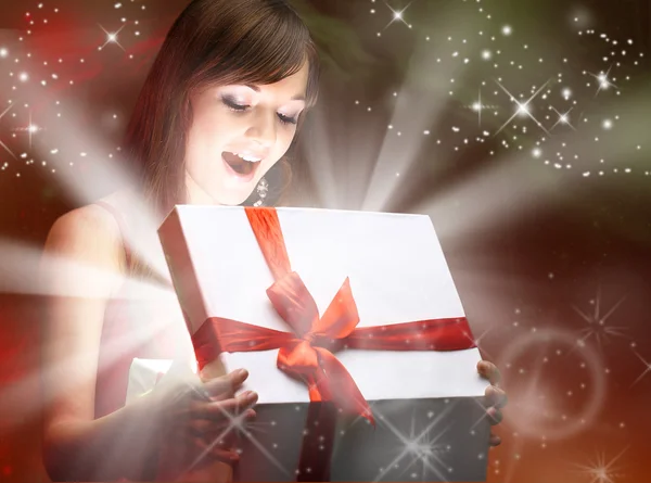 Girl and gift Royalty Free Stock Images
