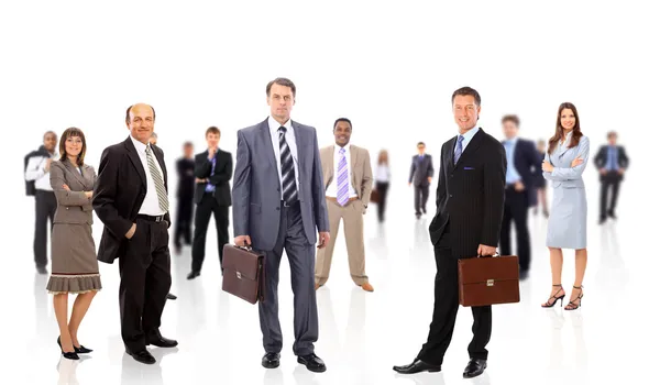 ビジネス チームは白い背景の上に立っている若いビジネスマンの形成 ストックフォト