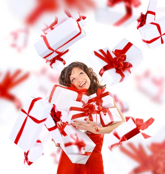 Excited attractive woman with many gift boxes and bags. — Stok fotoğraf
