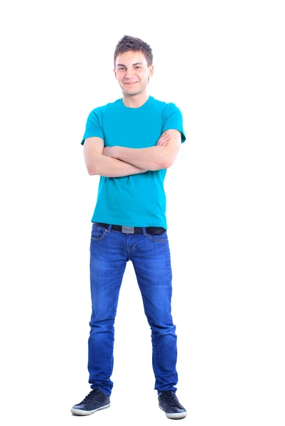 Полный портрет стильного молодого человека, стоящего с руками в карманах — стоковое фото