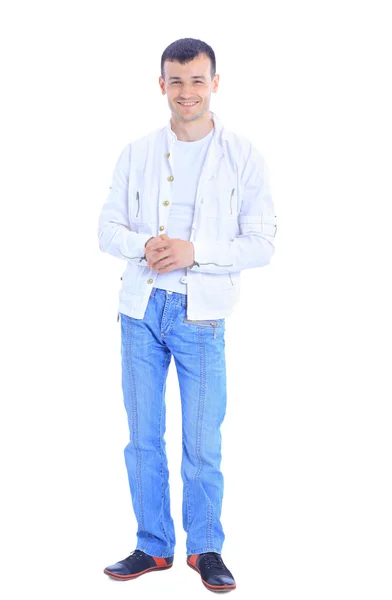 Молодой человек стоит с руками в карманах — стоковое фото