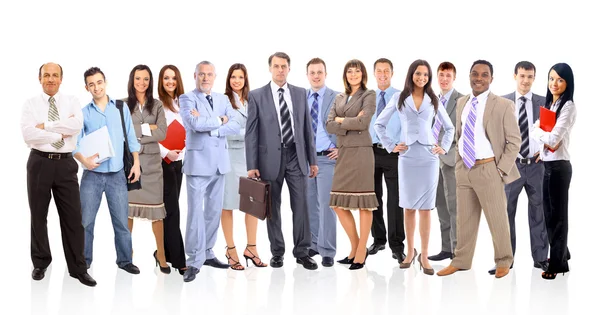 Команда бізнесу, що складається з молодих бізнесменів, що стоять на білому тлі — стокове фото