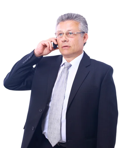 Happy mature executive talking on mobile phone isolated on white background — Stock Photo, Image