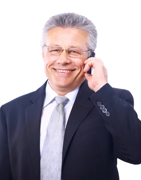 Reifer Manager gibt Erklärungen und telefoniert am Handy — Stockfoto