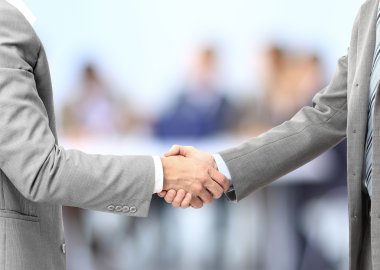 Business men hand shake in the office clipart