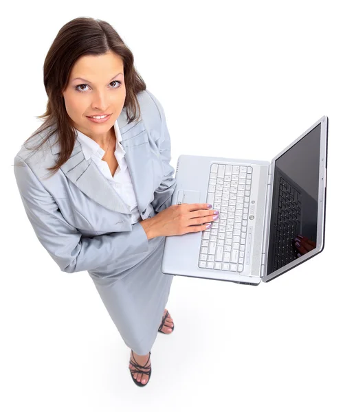 Beautiful businesswoman working on the lapto — Stock Photo, Image
