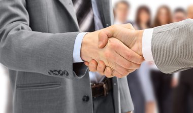 Handshake isolated on business background