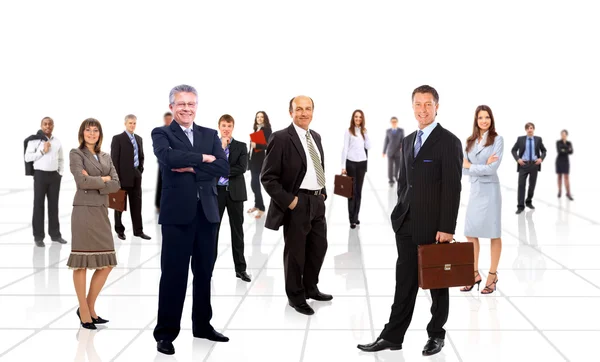 Equipe de negócios formada por jovens empresários em pé sobre um fundo branco — Fotografia de Stock