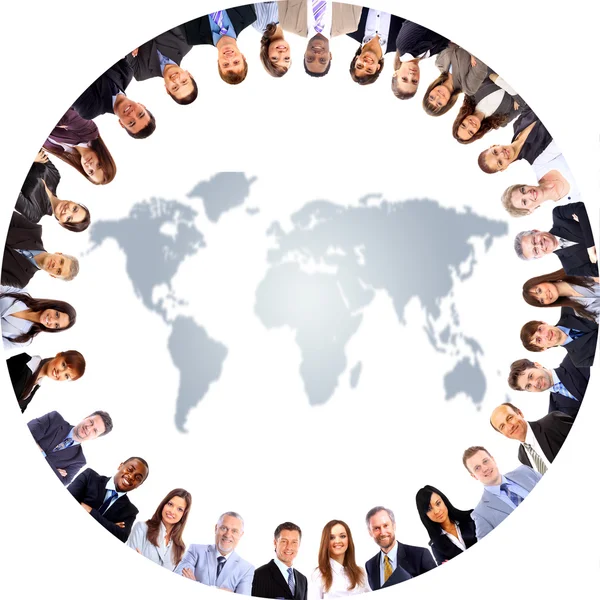 Equipe de negócios com mapa do mundo — Fotografia de Stock