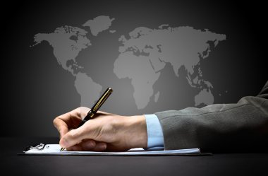 Businessman's hand with pen clipart