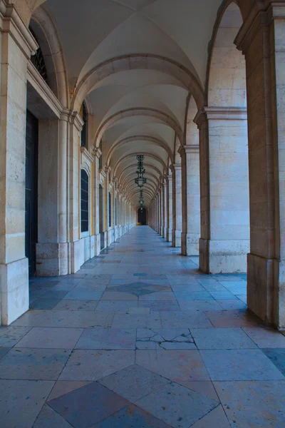 Площа комерції аркади 18-го століття в Лісабоні, Португалія Ліцензійні Стокові Фото