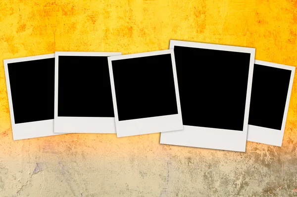 Five Blank Photos on Concrete Wall — Stock Photo, Image