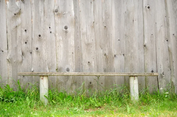 stock image Old Bench Against Wooden Wall