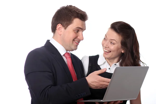 Casual couple looking at laptop — Stockfoto