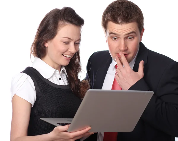 Casual couple looking at laptop — Stock Photo, Image