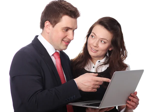 Casual couple looking at laptop — Stock Photo, Image