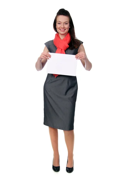 Woman holding a blank sign in business wear — Stock Photo, Image
