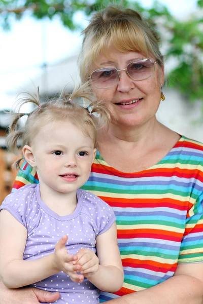 Stock image Grandmother with baby