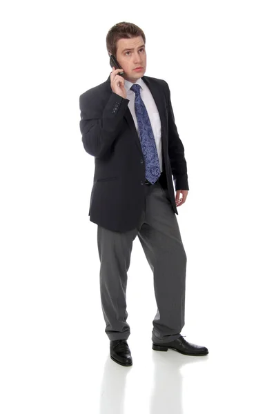Affärsman och ringer via telefon — Stockfoto
