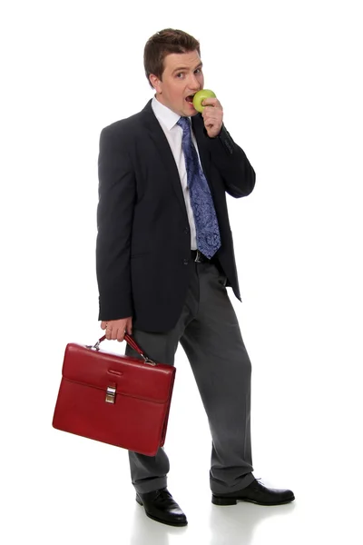Hombre de negocios y manzana verde — Foto de Stock