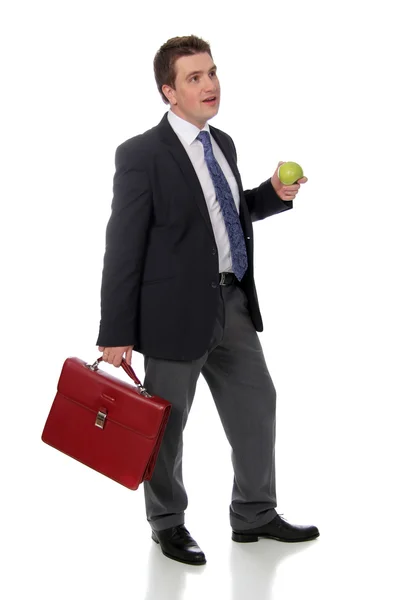 ビジネスの男と緑のリンゴ — ストック写真