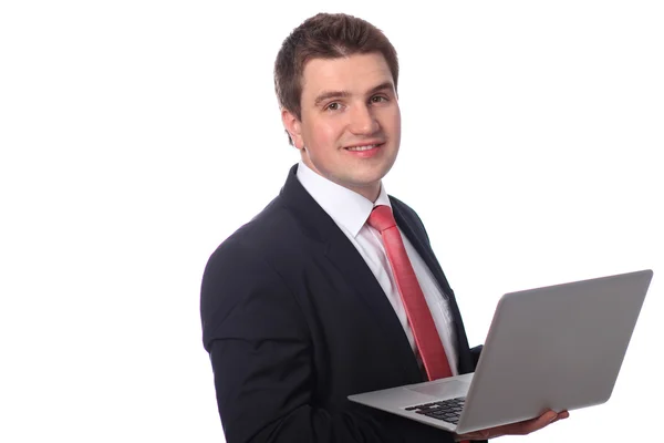 Ο άνθρωπος των επιχειρήσεων με ένα φορητό υπολογιστή που απομονώνονται σε λευκό — Φωτογραφία Αρχείου