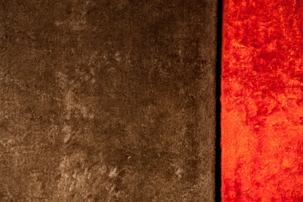 Stock image Brown and red velour background