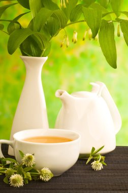 Herbal medicine, tea with clower flower clipart