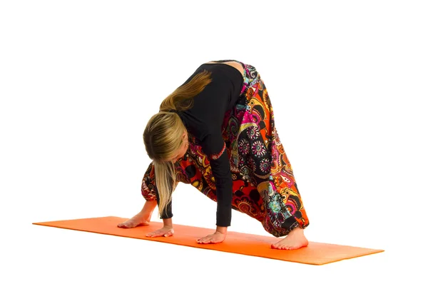 Prasarita Padottanasana a position in Yoga, is also called Wide-Legged Forw — Stock Photo, Image