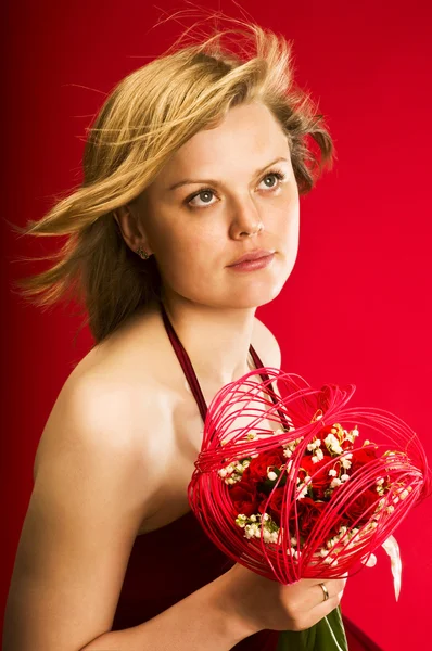 Mooi meisje met boeket van mei-lelies — Stockfoto