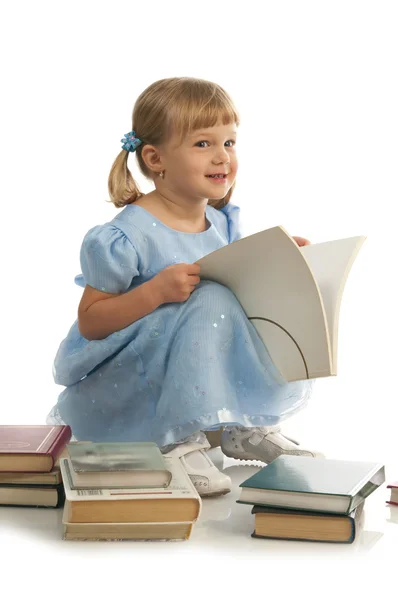 Meisje met stapel boeken — Stockfoto