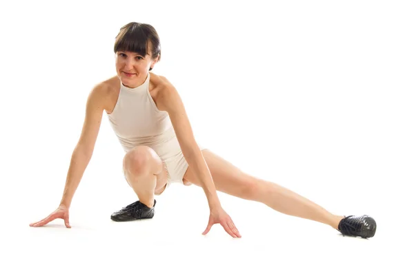 Atrakcyjny brunetka dziewczyna robi aktywne ćwiczenia — Zdjęcie stockowe