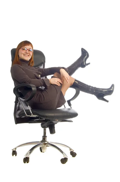 Young business lady sitting on chair — Stock Photo, Image