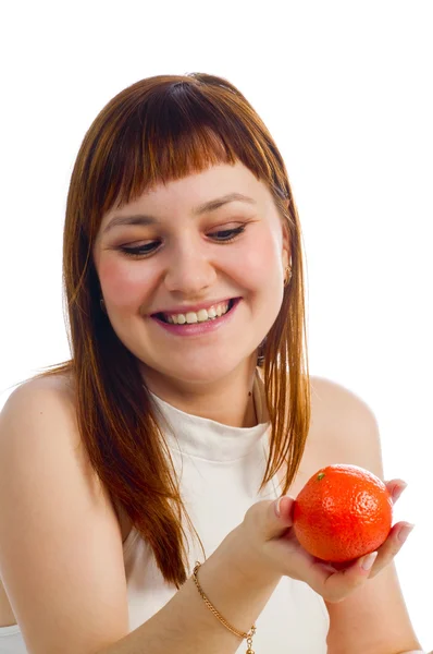 Girl with mandarine — Stock Photo, Image