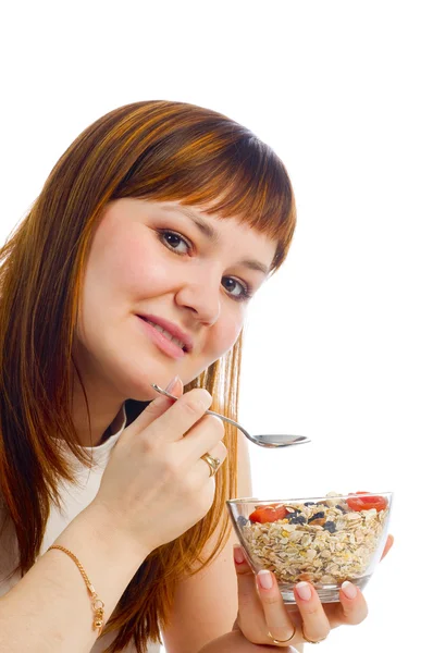 Menina comendo muesli — Fotografia de Stock