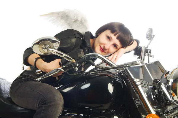 Olhar distante menina motociclista com asas de anjo — Fotografia de Stock