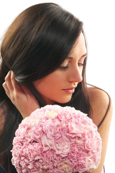 Beautiful girl with a bouquet of carnations — Stock Photo, Image