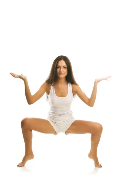 Vacker flicka visar yogi asanas — Stockfoto