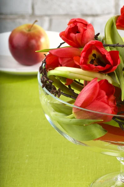 Tulips and apple — Stock Photo, Image