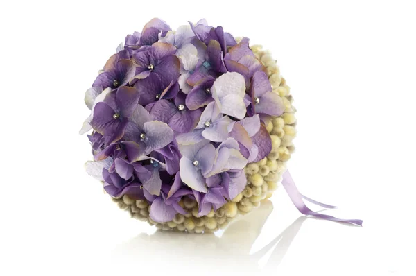 A bouquet of hydrangeas decorated with bracelet and studs — Stock Photo, Image