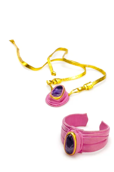 Beautiful pink bracelet and pendant, isolated on white — Stock Photo, Image