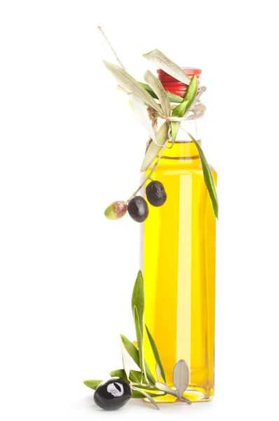 Бутылка оливкового масла и ветка изолированы — стоковое фото