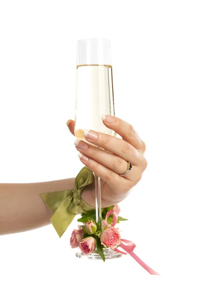 Держать стакан шампанского — стоковое фото