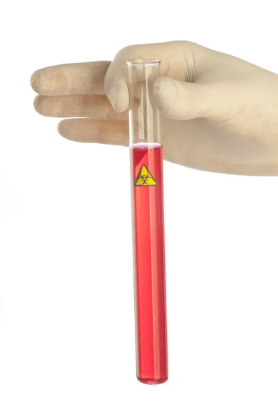 Mão segurando um tubo de ensaio — Fotografia de Stock