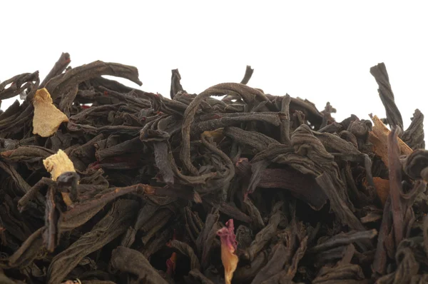 Zwarte thee bladeren achtergrond — Stockfoto