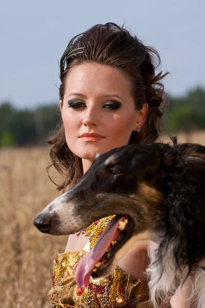 The young woman with borzoi — Stock Photo, Image