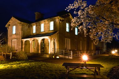 Old Railway Hotel at night and cherry blossom clipart