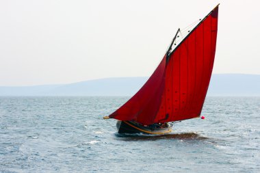 Galway hooker boat at Ocean race clipart