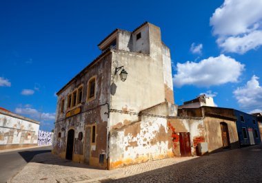 Old building in algarvian town clipart